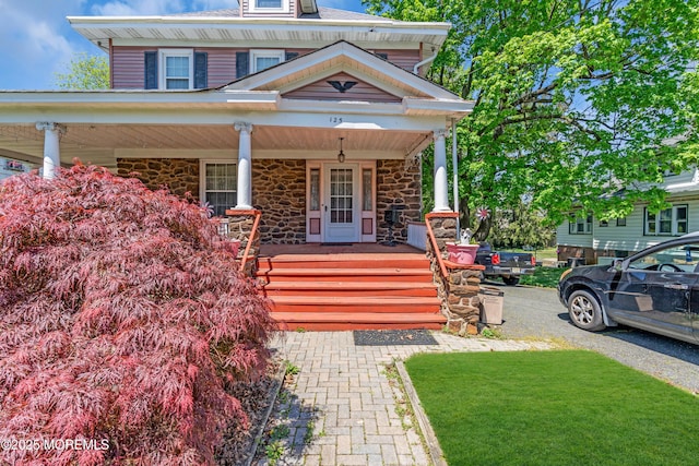 125 W Main St, Freehold, NJ 07728 - view of front facade with covered porch and stone siding