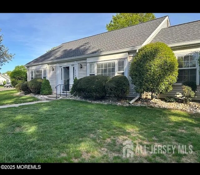 655 Yale Way Unit A, Monroe, NJ 08831 - view of front of property with a front lawn and roof with shingles