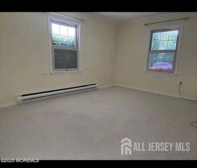 655 Yale Way Unit A, Monroe, NJ 08831 - carpeted spare room featuring baseboard heating, healthy amount of natural light, and baseboards