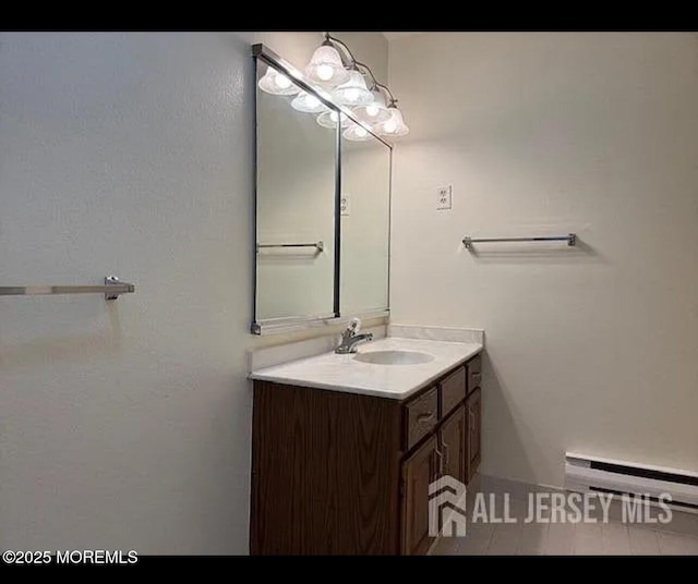 655 Yale Way Unit A, Monroe, NJ 08831 - bathroom featuring baseboard heating and vanity