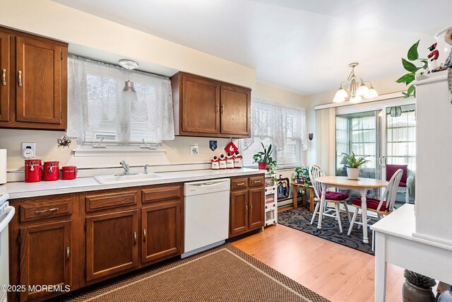 8 Constable St, Brick, NJ 08724 - kitchen featuring a sink, light wood-style flooring, dishwasher, and light countertops
