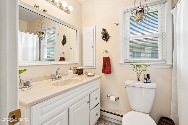 8 Constable St, Brick, NJ 08724 - full bath with vanity, a baseboard heating unit, and toilet
