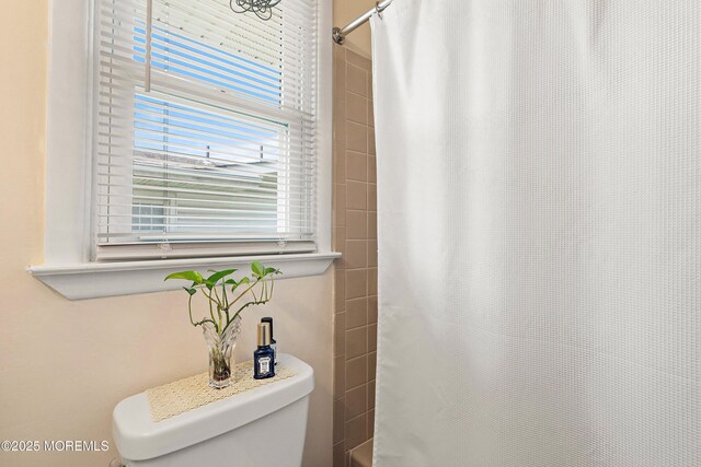 8 Constable St, Brick, NJ 08724 - full bathroom featuring shower / tub combo with curtain, toilet, and a wealth of natural light