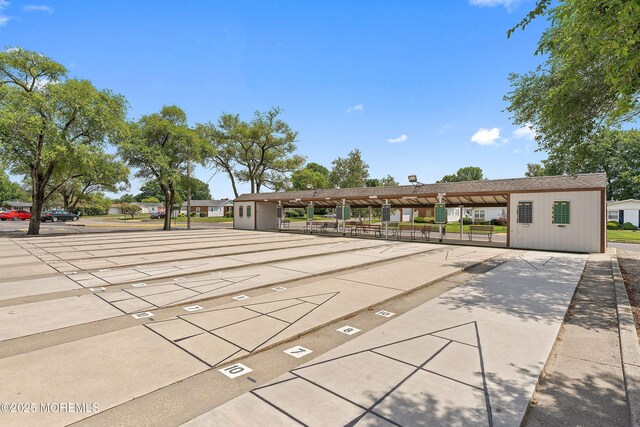 8 Constable St, Brick, NJ 08724 - view of community featuring covered and uncovered parking and shuffleboard