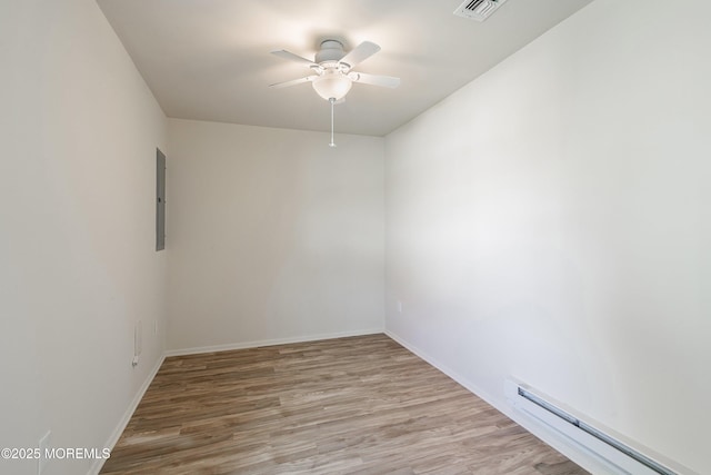 8 Constable St, Brick, NJ 08724 - unfurnished room featuring a baseboard heating unit, ceiling fan, and wood finished floors