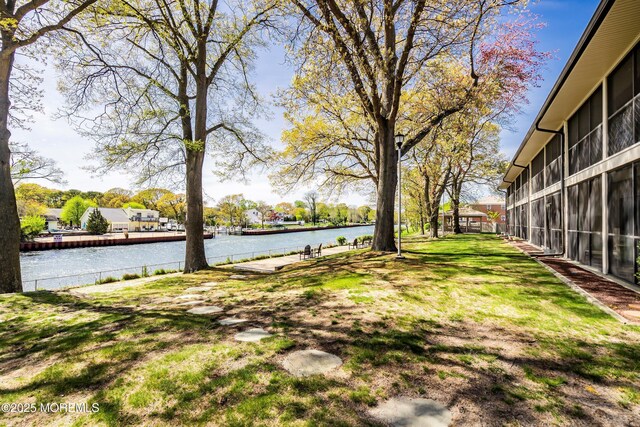 view of yard with a water view