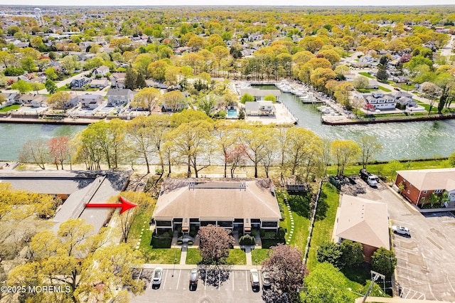 aerial view featuring a water view and a residential view