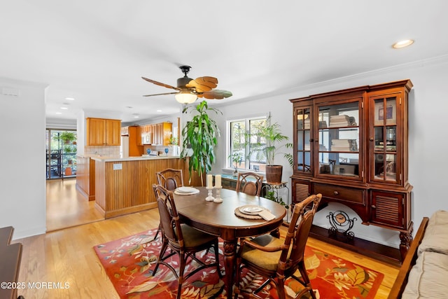 dining room with recessed lighting, baseboards, a ceiling fan, and light wood-type flooring