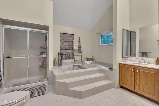 full bath featuring a bath, tile patterned flooring, a shower stall, vanity, and lofted ceiling
