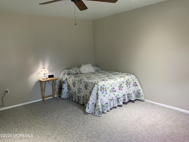 carpeted bedroom with baseboards and ceiling fan