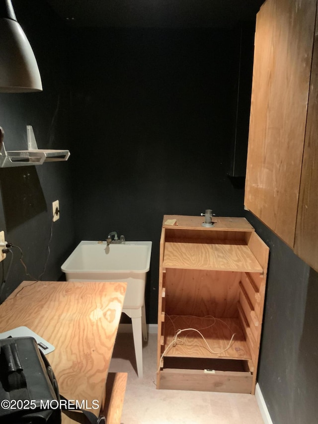 bathroom featuring baseboards