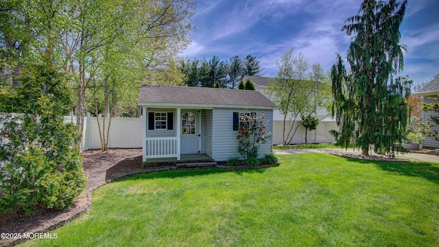 view of outbuilding with an outdoor structure and fence private yard