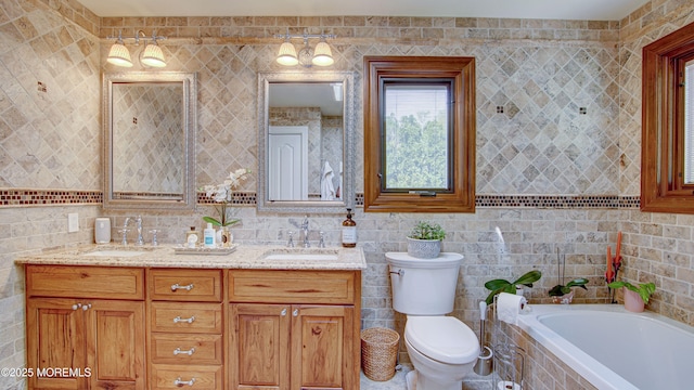 full bath featuring double vanity, toilet, tile walls, and a sink