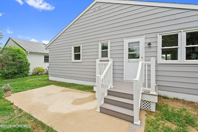 82 Fox Glove, Toms River, NJ 08755 - back of property with a lawn and a patio area