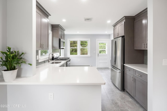 82 Fox Glove, Toms River, NJ 08755 - kitchen featuring recessed lighting, light countertops, visible vents, and appliances with stainless steel finishes