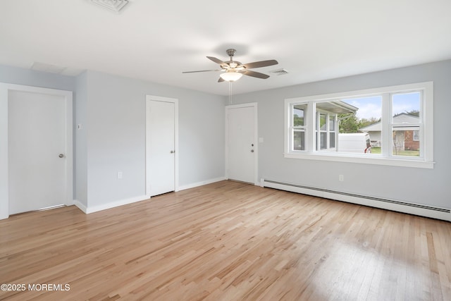 82 Fox Glove, Toms River, NJ 08755 - empty room featuring a ceiling fan, a baseboard radiator, light wood-style flooring, baseboards, and visible vents