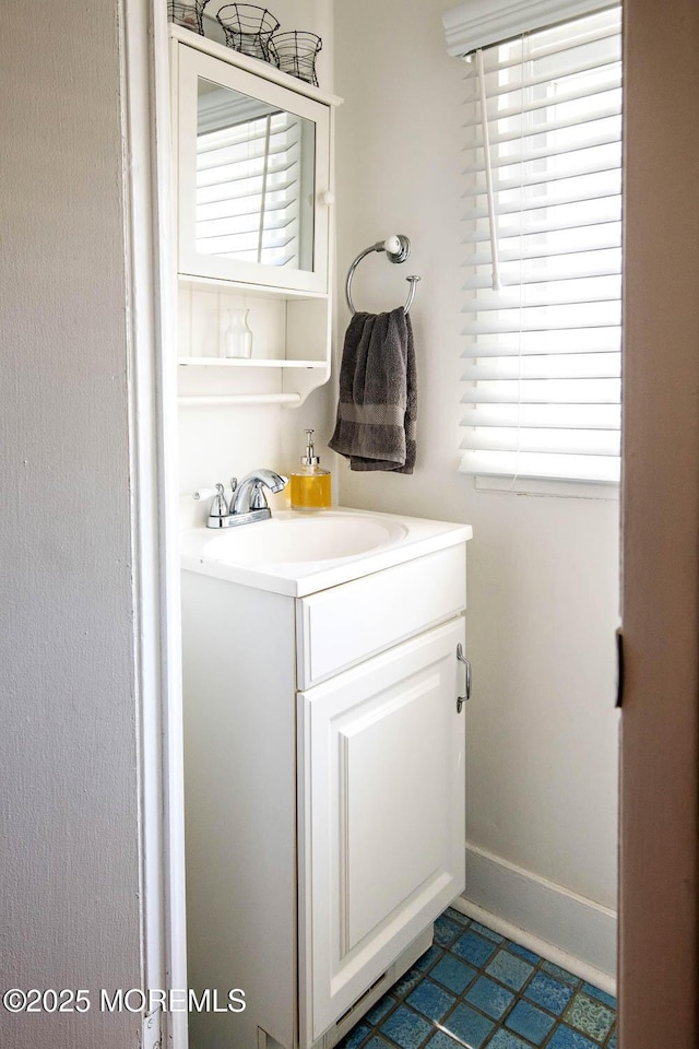bathroom featuring vanity and tile patterned flooring