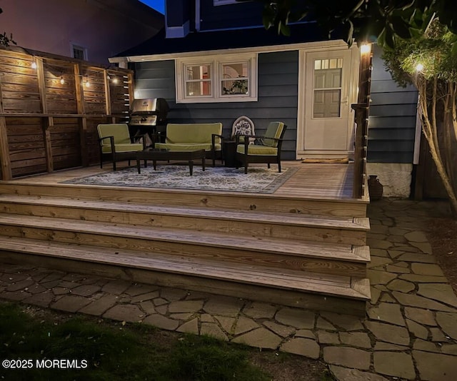 deck with fence, a grill, visible vents, and outdoor lounge area