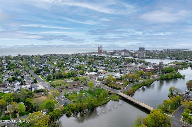aerial view featuring a water view and a city view
