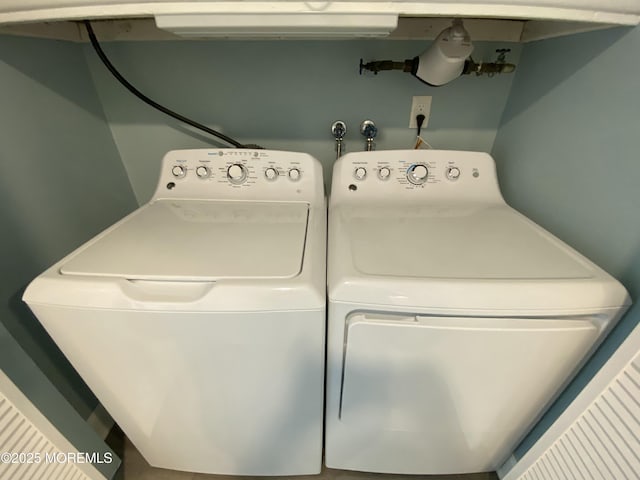laundry room with laundry area and washer and dryer
