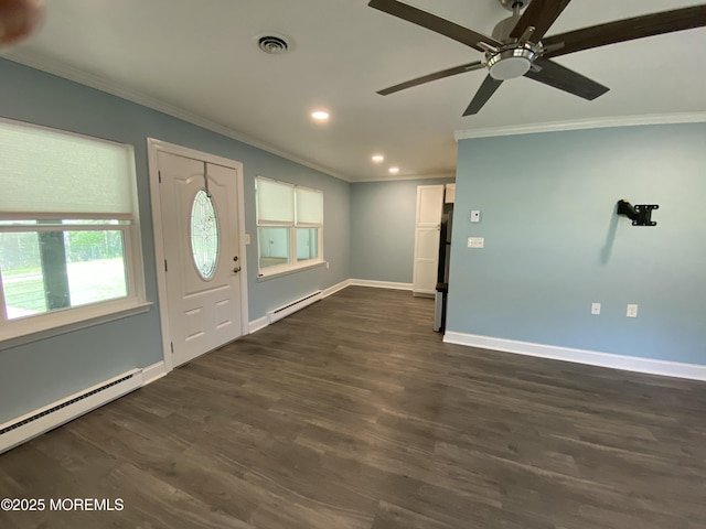foyer with baseboards, ornamental molding, baseboard heating, and recessed lighting