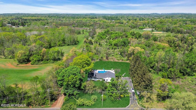 115 Phalanx Rd, Colts Neck, NJ 07722 - drone / aerial view featuring a wooded view