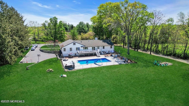 115 Phalanx Rd, Colts Neck, NJ 07722 - pool featuring a patio area, a wooden deck, and a yard