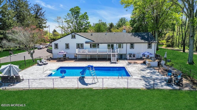 115 Phalanx Rd, Colts Neck, NJ 07722 - view of pool featuring fence, stairs, a wooden deck, and a yard