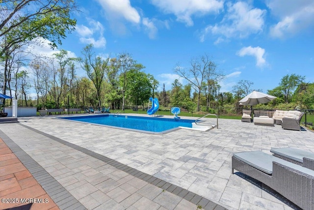 115 Phalanx Rd, Colts Neck, NJ 07722 - view of pool featuring fence, a water slide, an outdoor hangout area, and a patio area