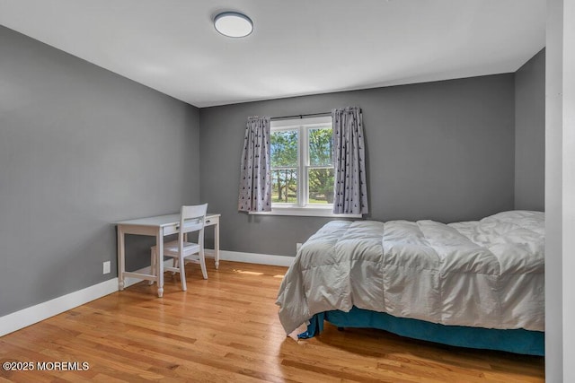 115 Phalanx Rd, Colts Neck, NJ 07722 - bedroom with baseboards and wood finished floors