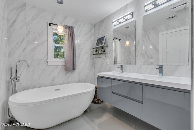 115 Phalanx Rd, Colts Neck, NJ 07722 - full bathroom with a sink, tile walls, double vanity, and a freestanding tub