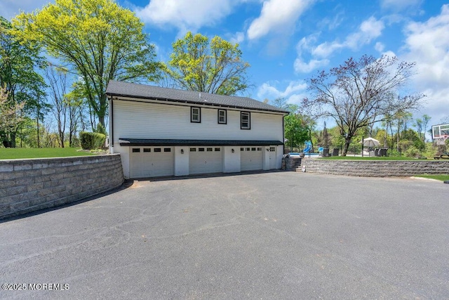 115 Phalanx Rd, Colts Neck, NJ 07722 - garage featuring aphalt driveway