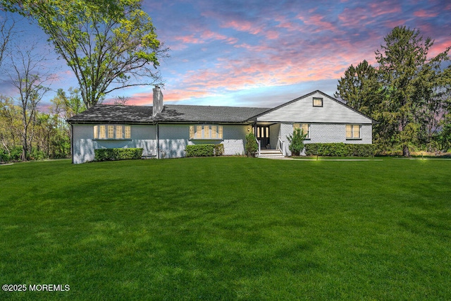 115 Phalanx Rd, Colts Neck, NJ 07722 - ranch-style house featuring a lawn, brick siding, and a chimney