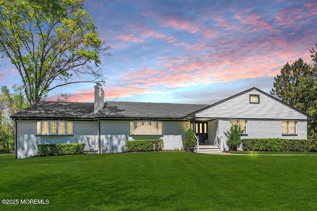 115 Phalanx Rd, Colts Neck, NJ 07722 - ranch-style home featuring a lawn, brick siding, and a chimney
