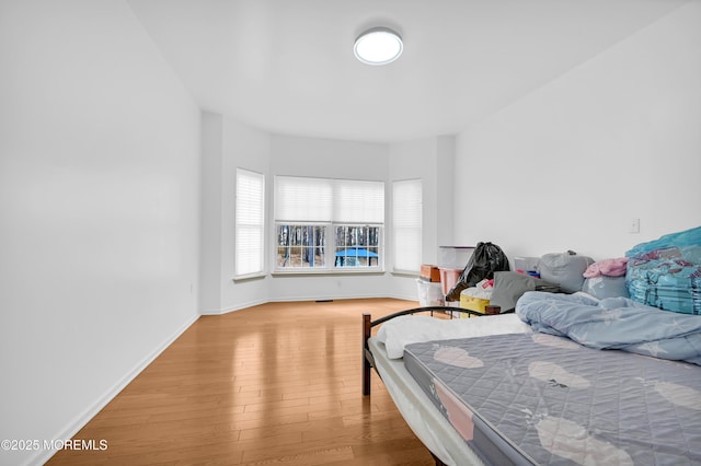 65 Mill Pond Rd, Jackson, NJ 08527 - bedroom featuring baseboards and wood finished floors