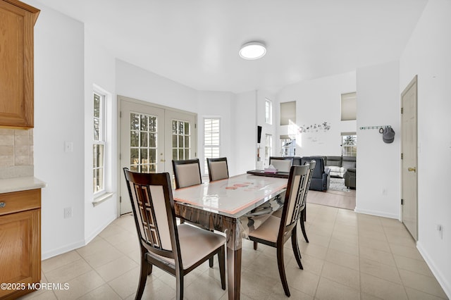 65 Mill Pond Rd, Jackson, NJ 08527 - dining area with light tile patterned floors, baseboards, and french doors