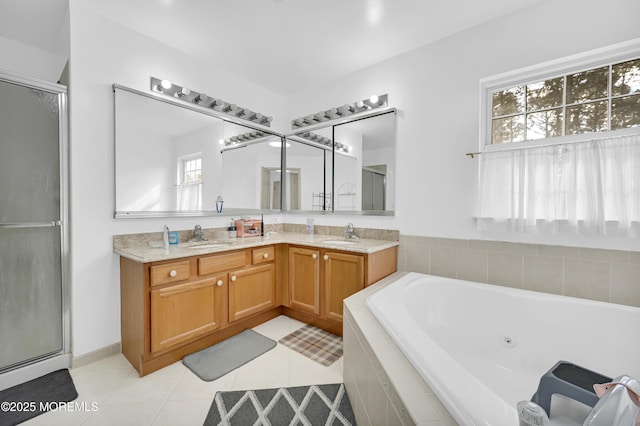 65 Mill Pond Rd, Jackson, NJ 08527 - full bathroom with a tub with jets, a sink, tile patterned floors, and a shower stall