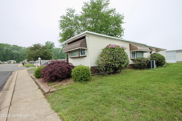 155 Wren Way, Freehold, NJ 07728 - view of side of property with a yard and central AC