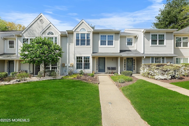 view of property featuring a front yard
