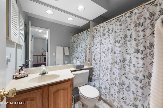 bathroom featuring vanity, recessed lighting, a shower with shower curtain, and toilet