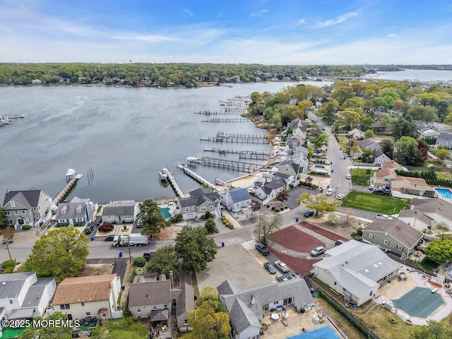 aerial view with a water view and a residential view