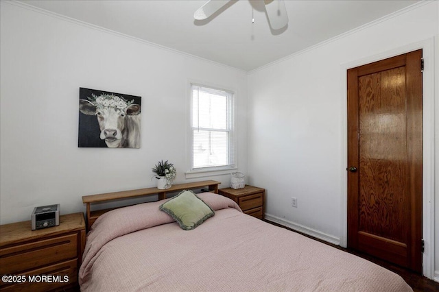 bedroom with ornamental molding and ceiling fan