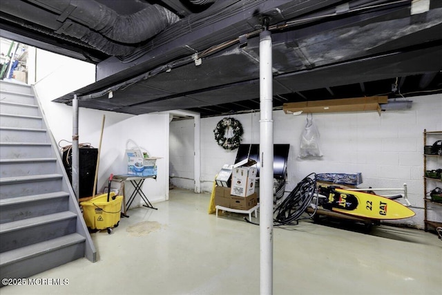 unfinished basement with stairs