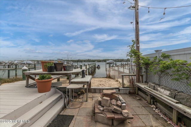 view of patio / terrace featuring a water view
