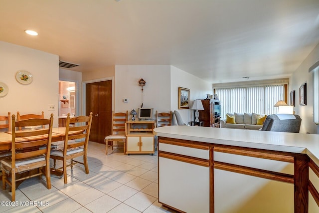 8 Stockport Dr, Toms River, NJ 08757 - kitchen with light countertops, open floor plan, light tile patterned floors, and white cabinets