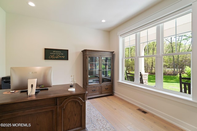 office area featuring light wood-type flooring, baseboards, and recessed lighting