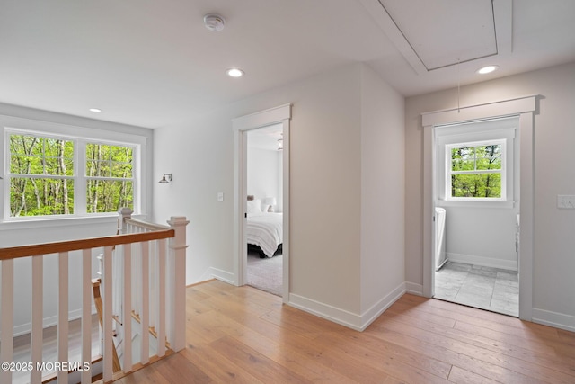 entrance foyer with baseboards, recessed lighting, and light wood-style floors