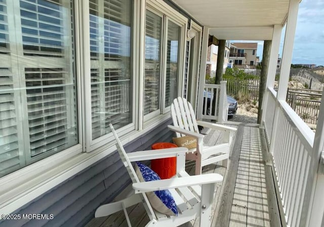 balcony featuring covered porch