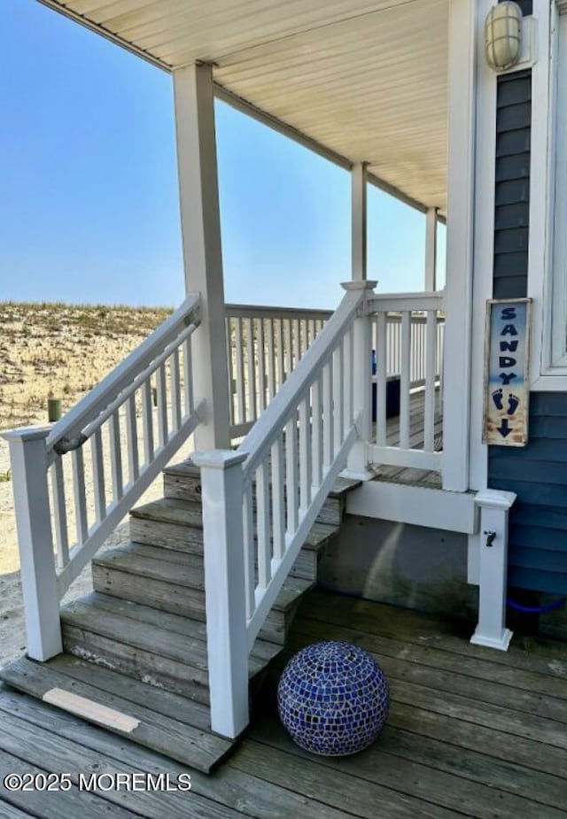 wooden deck with stairway