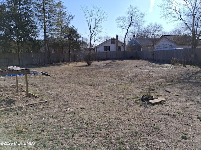 view of yard featuring fence